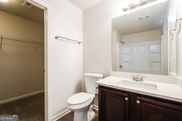 a bathroom with a sink and a toilet