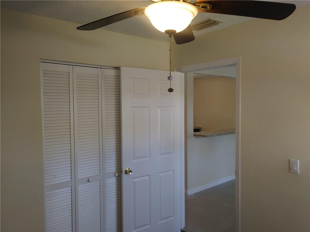 1474 Southwest Del Rio Boulevard Port St. Lucie, FL 34953 - Photo 8 of 9 a bathroom with a shower