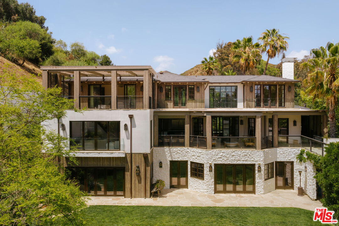 1105 Rivas Canyon Road Pacific Palisades, CA 90272 - Photo 6 of 49 a view of residential houses with yard