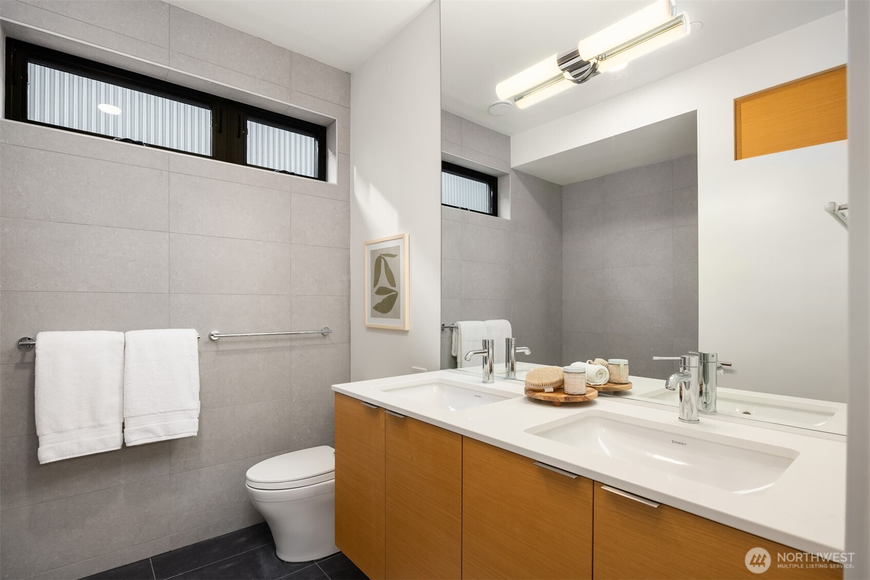 200 Shepard Way Northwest Bainbridge Island, WA 98110 - Photo 17 of 29 a bathroom with a sink and a mirror