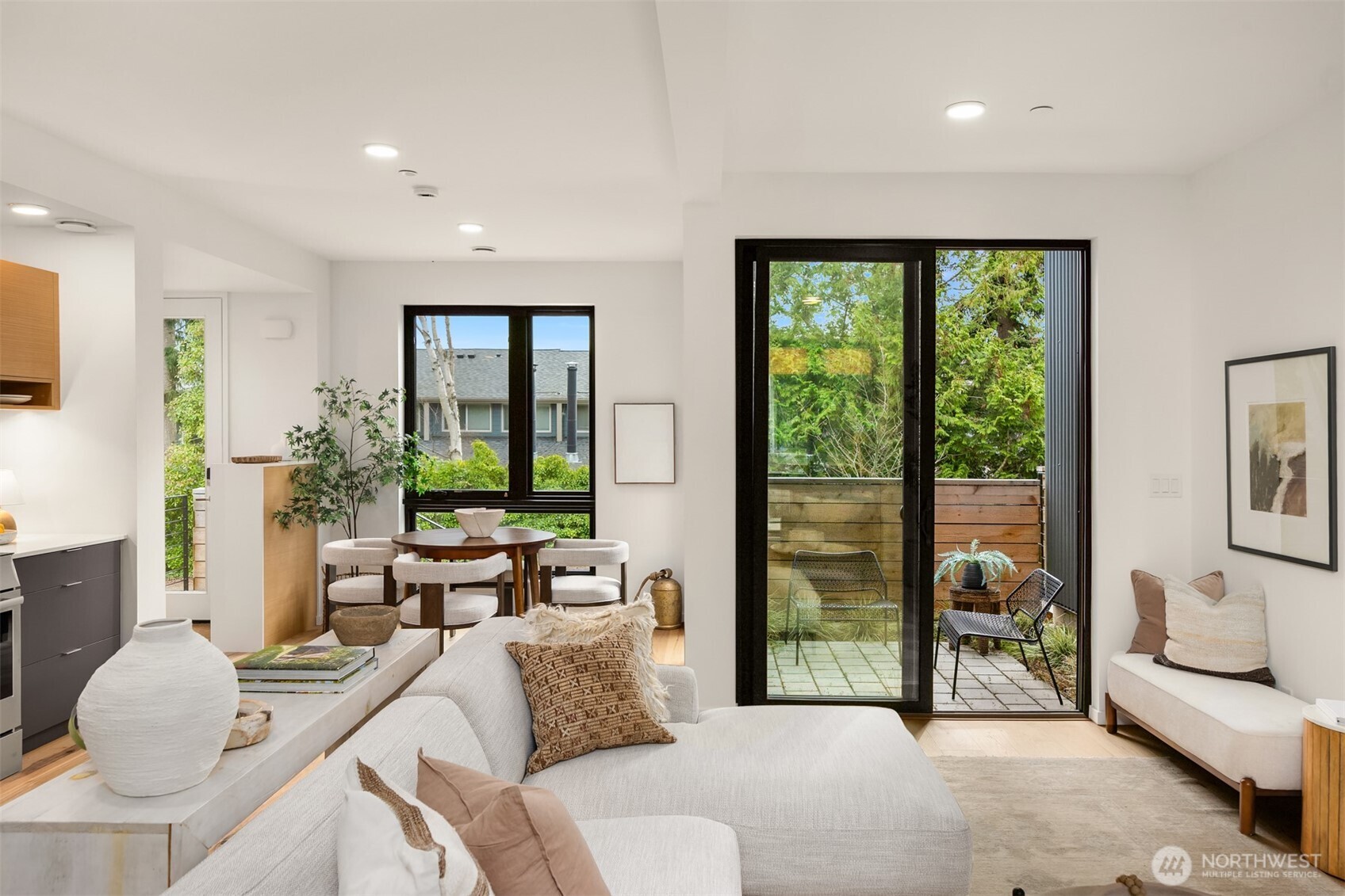 200 Shepard Way Northwest Bainbridge Island, WA 98110 - Photo 6 of 29 a living room with furniture and a large window