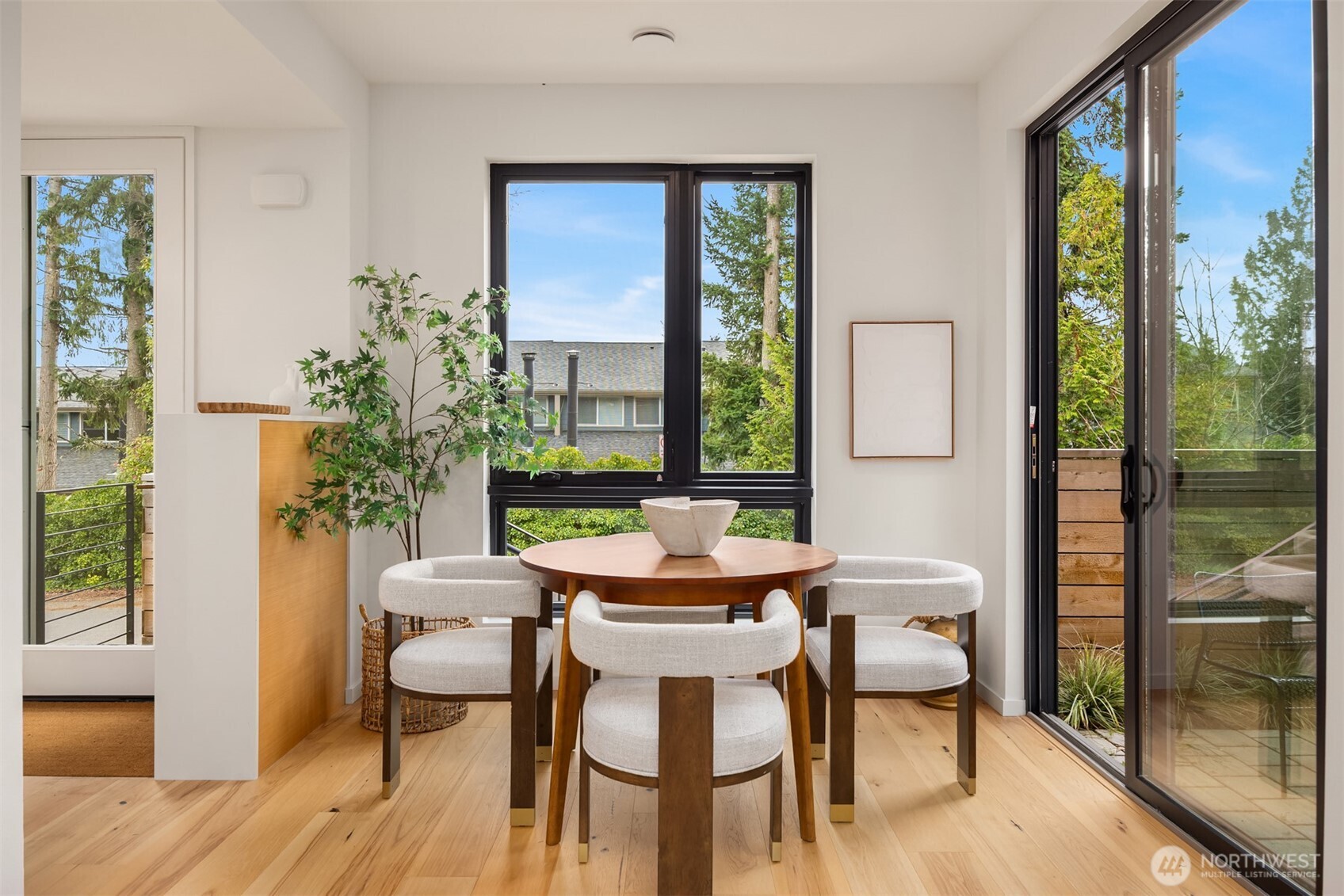 200 Shepard Way Northwest Bainbridge Island, WA 98110 - Photo 8 of 29 a dining room with furniture and wooden floor
