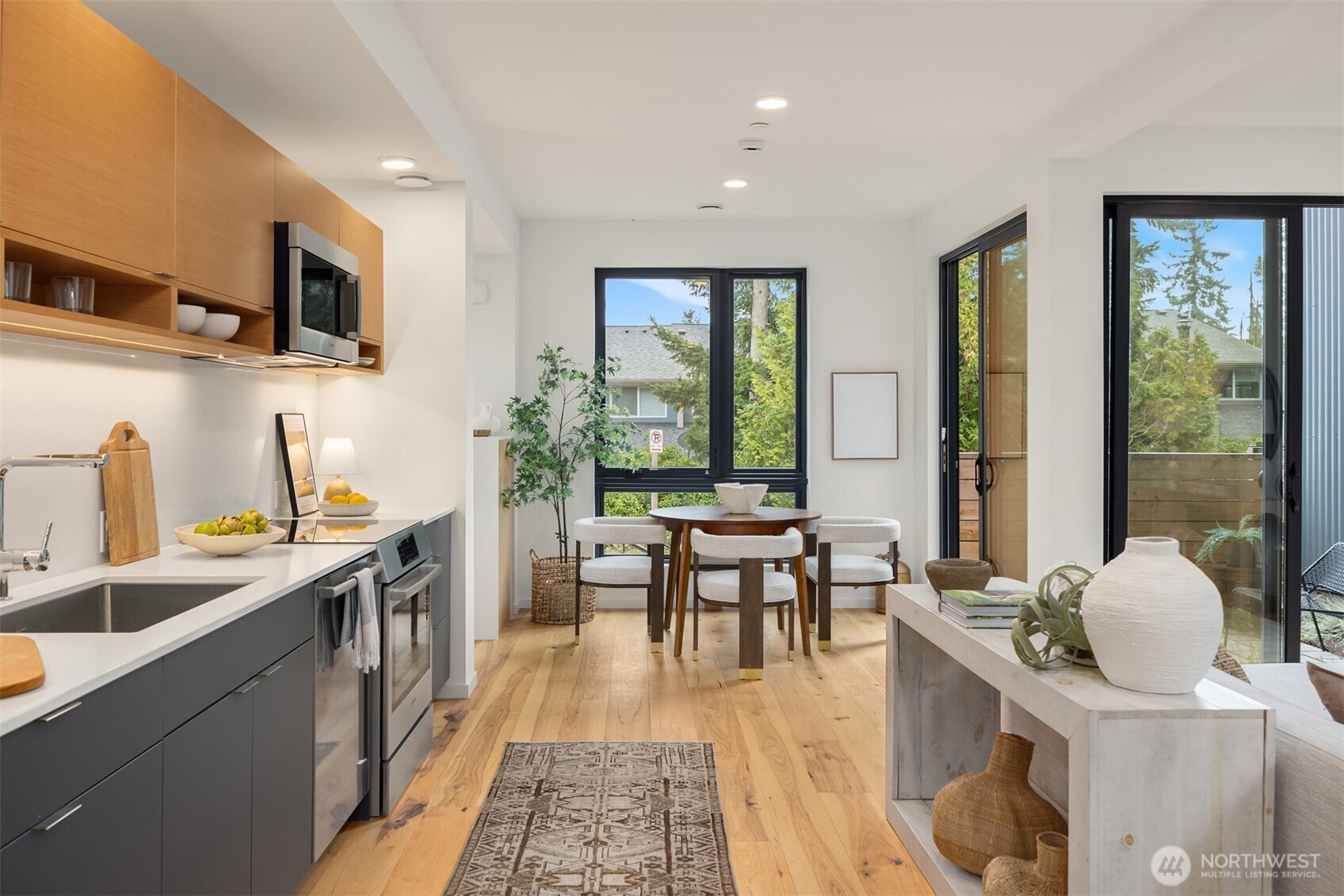 200 Shepard Way Northwest Bainbridge Island, WA 98110 - Photo 9 of 29 a very nice looking living room with a large window and a flat screen tv