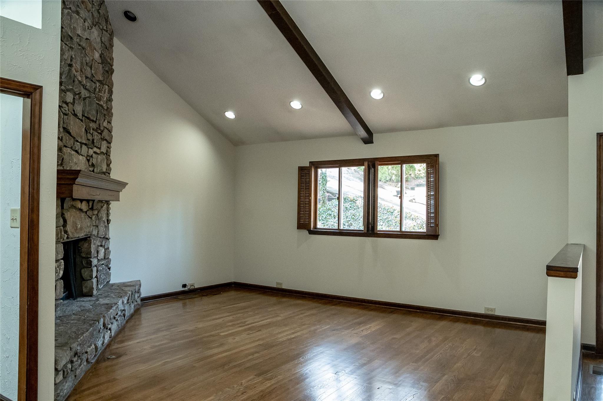 212 Riverside Drive Morganton, NC 28655 - Photo 12 of 44 a view of an empty room with wooden floor and a window