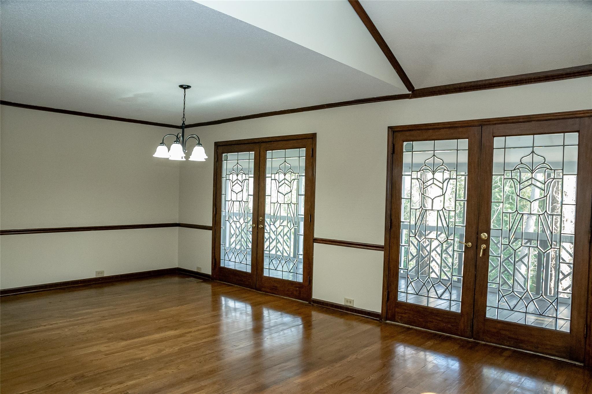 212 Riverside Drive Morganton, NC 28655 - Photo 16 of 44 a view of an empty room with wooden floor and a window