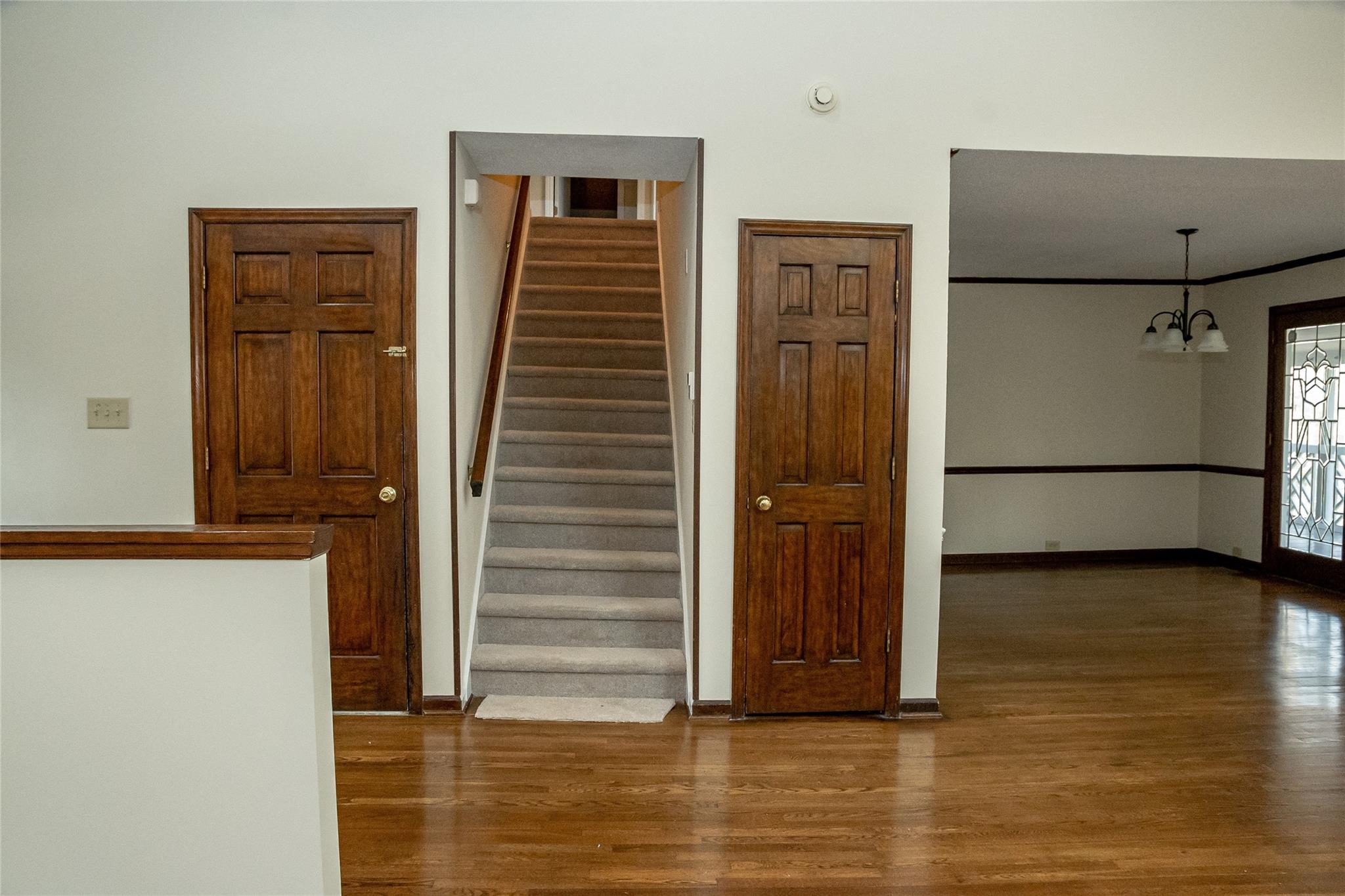 212 Riverside Drive Morganton, NC 28655 - Photo 24 of 44 a view of a hallway with wooden floor and staircase