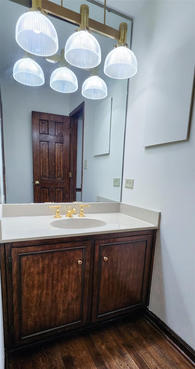 212 Riverside Drive Morganton, NC 28655 - Photo 26 of 44 a bathroom with a sink and a mirror
