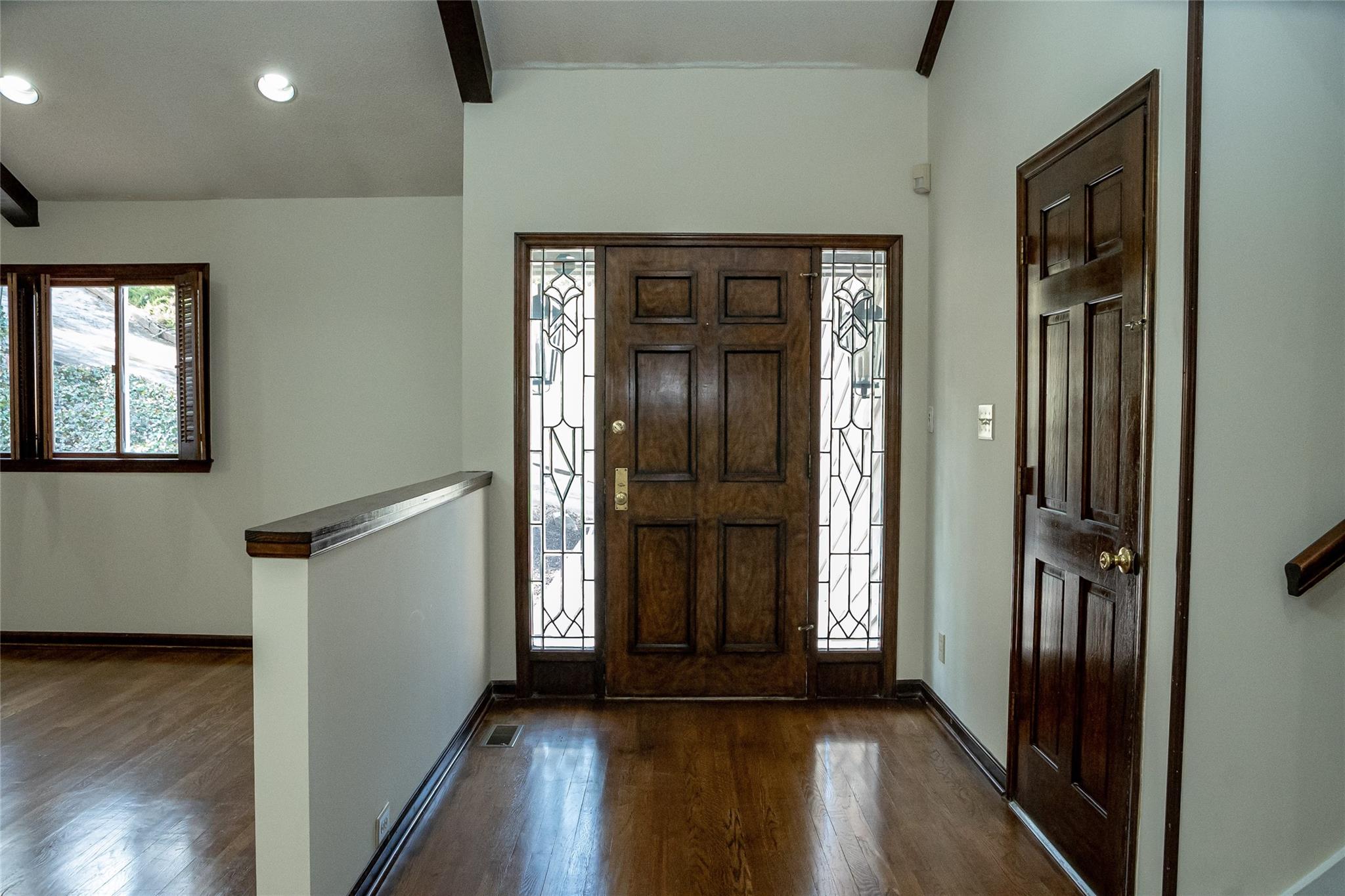 212 Riverside Drive Morganton, NC 28655 - Photo 9 of 44 a view of a hallway with wooden floor and staircase