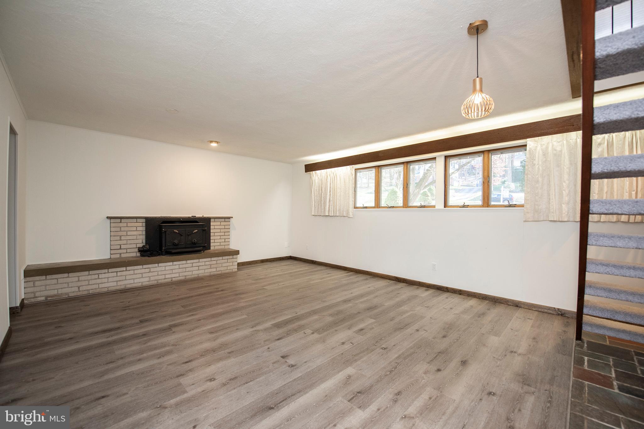 207 Vassar Circle Wayne, PA 19087 - Photo 22 of 28 Great room with fireplace