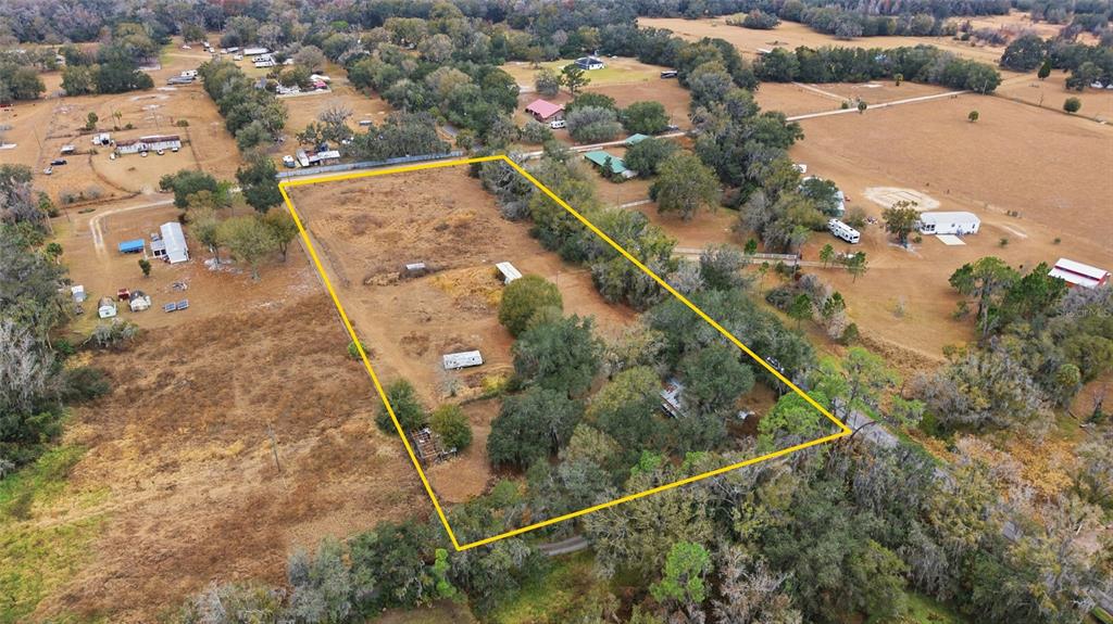 1823 Welcome Road Lithia, FL 33547 - Photo 14 of 17 an aerial view of residential houses with outdoor space