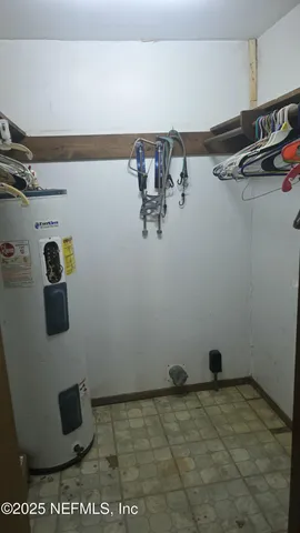 a view of a dining room with furniture and window