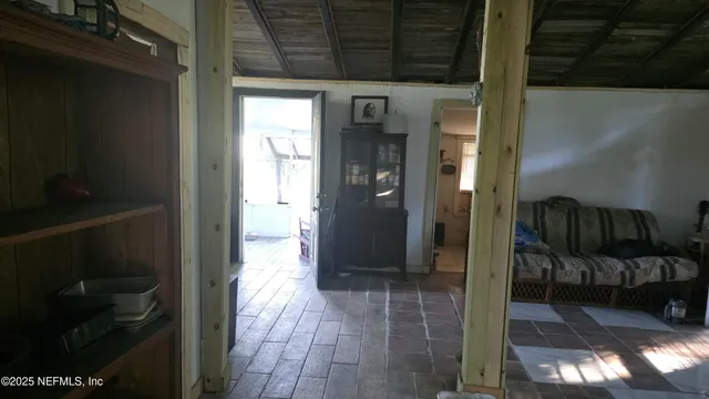 a view of a livingroom with furniture and a fireplace