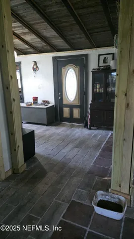 a view of a park with large trees