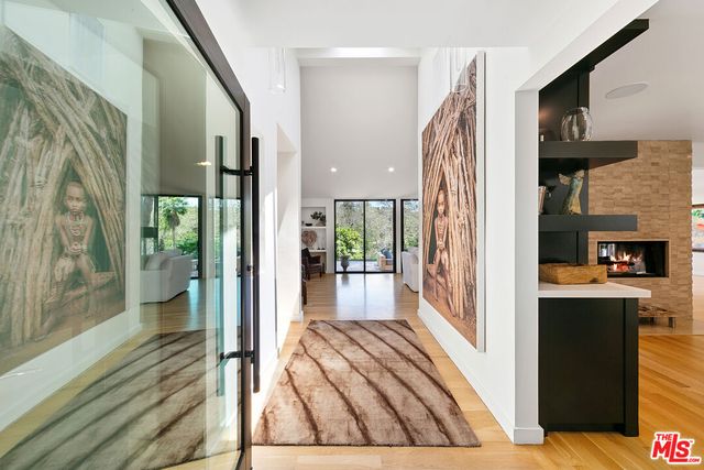 a view of a hallway and interior of the house