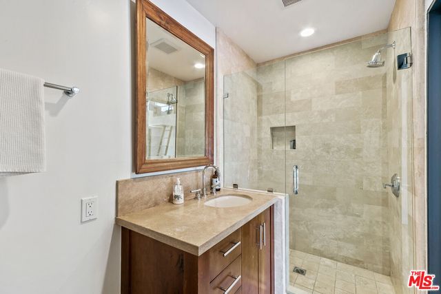 a view of a living room and furniture in a room