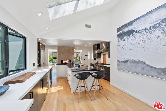 a utility room with sink dryer and washer