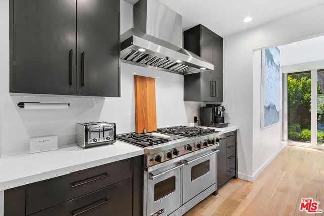 a bedroom with a large bed and a large window