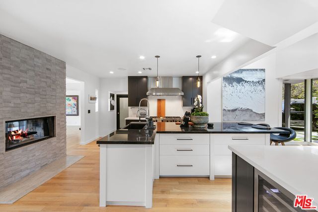 a view of a bedroom with furniture and cabinet