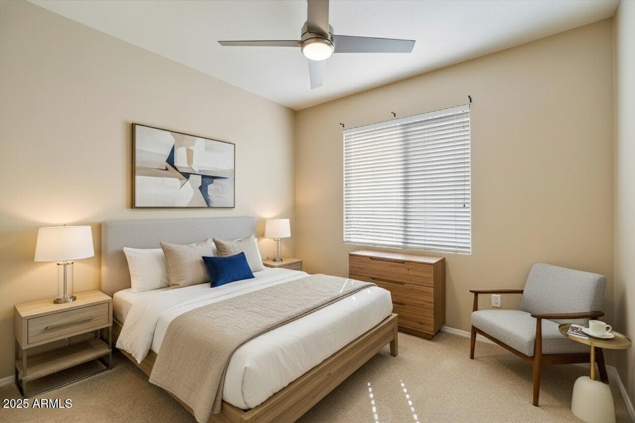 3250 West Greenway Road, Unit 151 Phoenix, AZ 85053 - Photo 21 of 31 a bedroom with a bed painting on wall and two large window