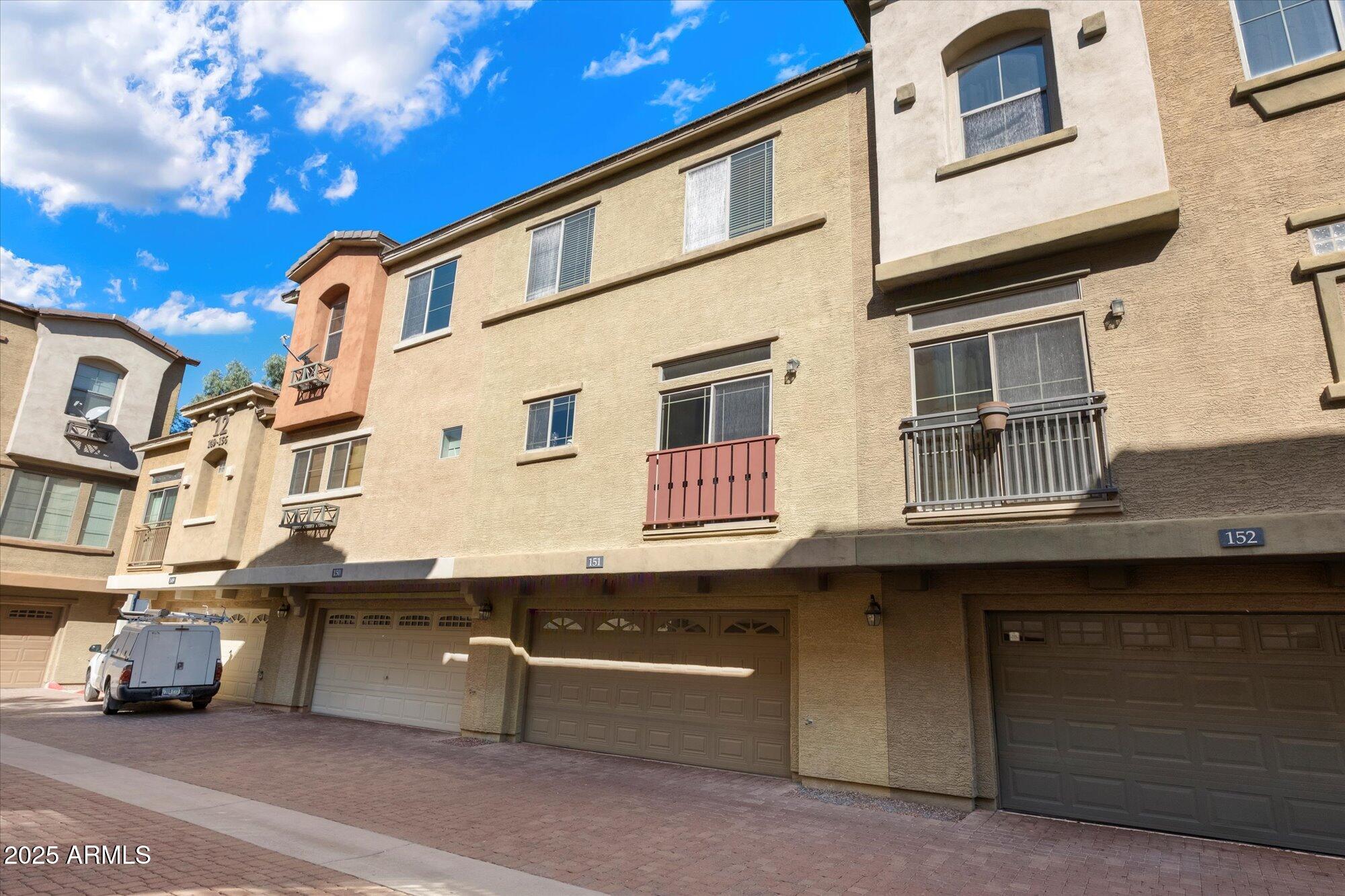 3250 West Greenway Road, Unit 151 Phoenix, AZ 85053 - Photo 27 of 31 a view of a street with buildings
