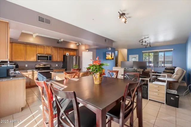 a view of a dining room with furniture