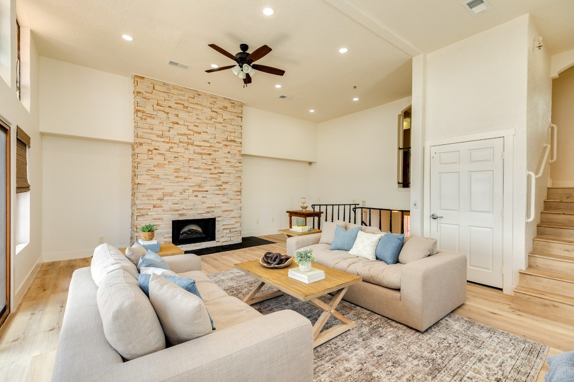 411 Sailfish Lane, Unit 101 Freeport, TX 77541 - Photo 14 of 40 a living room with furniture fireplace and a table