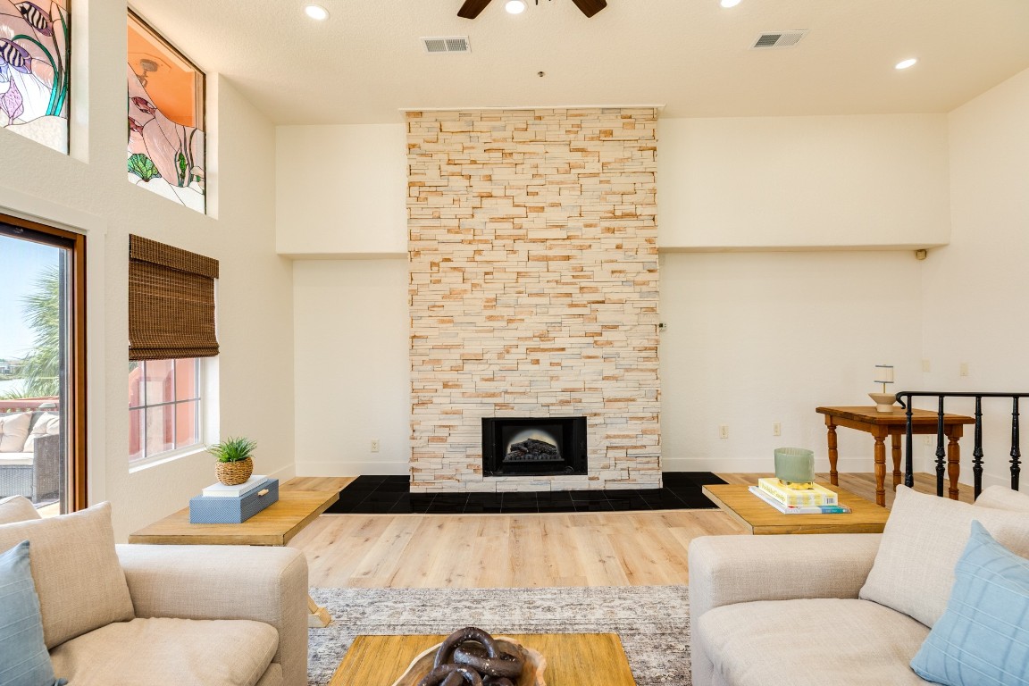 411 Sailfish Lane, Unit 101 Freeport, TX 77541 - Photo 15 of 40 a living room with furniture and a fireplace