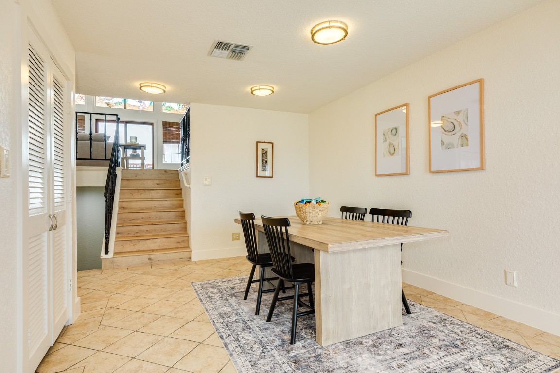 411 Sailfish Lane, Unit 101 Freeport, TX 77541 - Photo 5 of 40 a view of a dining room with furniture