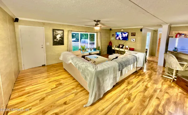 a bed room with bed and a night stand