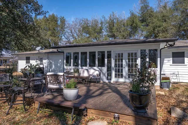 a view of a patio filled with furniture