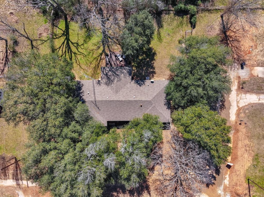 103 Brandon Street Edgewood, TX 75117 - Photo 29 of 29 a aerial view of a house with a yard