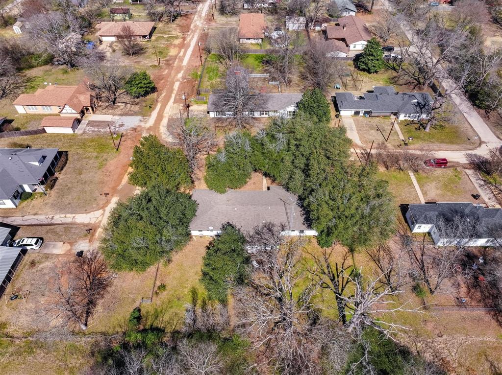 103 Brandon Street Edgewood, TX 75117 - Photo 6 of 29 an aerial view of residential houses with outdoor space