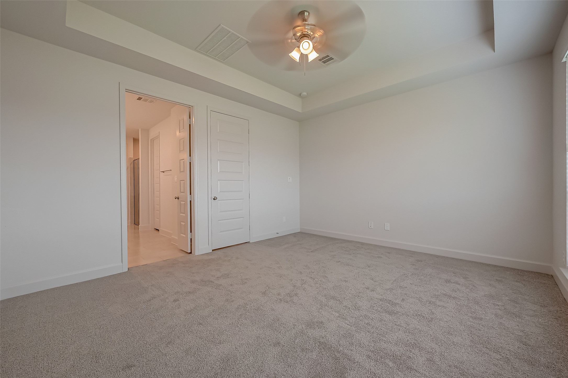30223 GOLD FINCH Place Fulshear, TX 77441 - Photo 35 of 45 a view of empty room with a chandelier fan