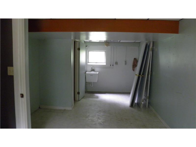 1180 Gypsy Glen Road Beaver, PA 15009 - Photo 11 of 13 Other. Laundry Room/Den located between Garage and Main House