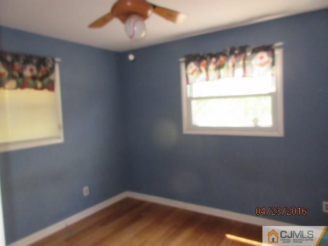 28 Raleigh Road Kendall Park, NJ 08824 - Photo 12 of 16 a view of empty room with window