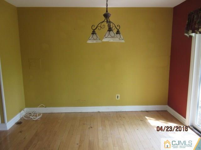 28 Raleigh Road Kendall Park, NJ 08824 - Photo 7 of 16 a view of a room with painted walls