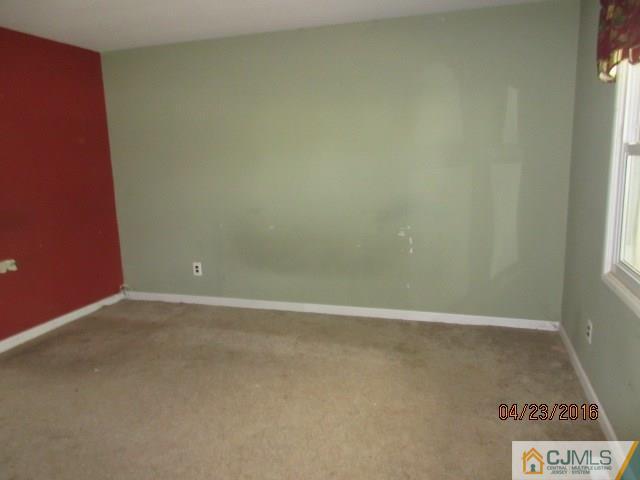 28 Raleigh Road Kendall Park, NJ 08824 - Photo 9 of 16 a view of an empty room