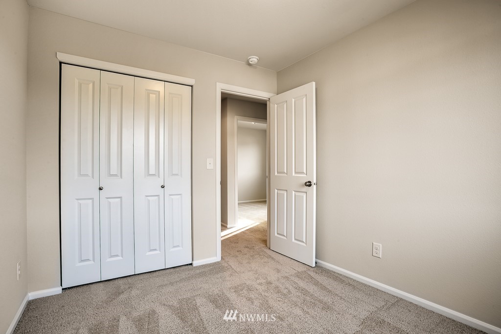 207 169th Place Southwest Bothell, WA 98012 - Photo 16 of 21 a view of an empty room with closet area