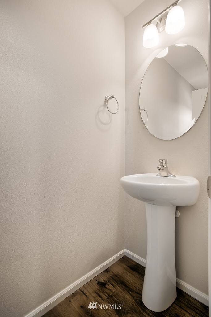 207 169th Place Southwest Bothell, WA 98012 - Photo 18 of 21 a bathroom with a sink and a mirror