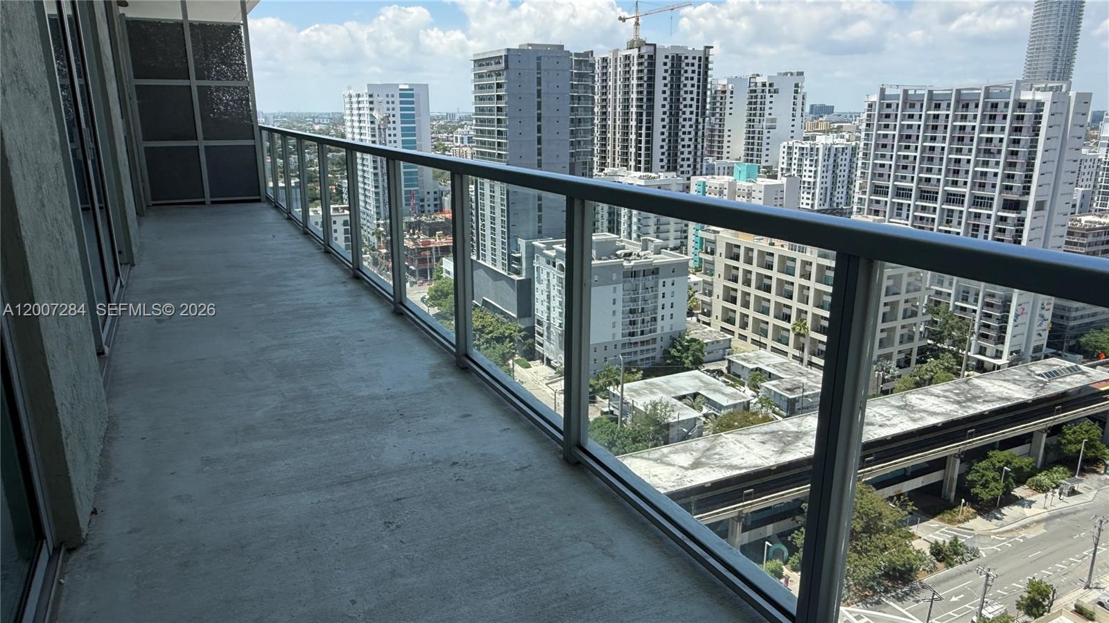 79 Southwest 12th Street, Unit 2509S Miami, FL 33130 - Photo 16 of 27 a view of a balcony with city view