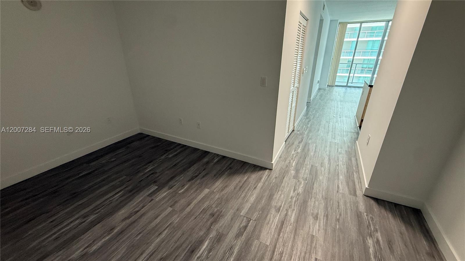 79 Southwest 12th Street, Unit 2509S Miami, FL 33130 - Photo 5 of 27 a view of wooden floor
