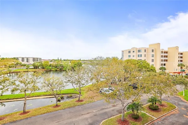 a view of a lake with building in front of it
