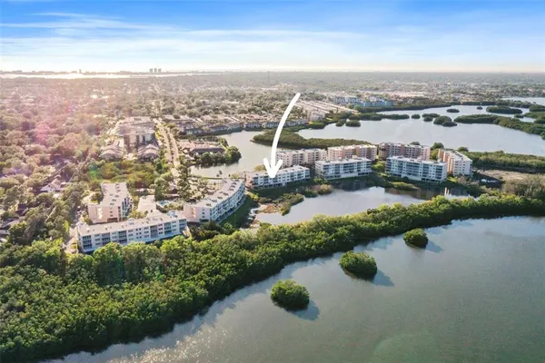 a view of a city with an ocean view