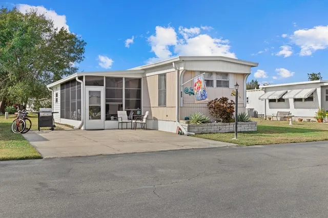 a front view of a house having patio