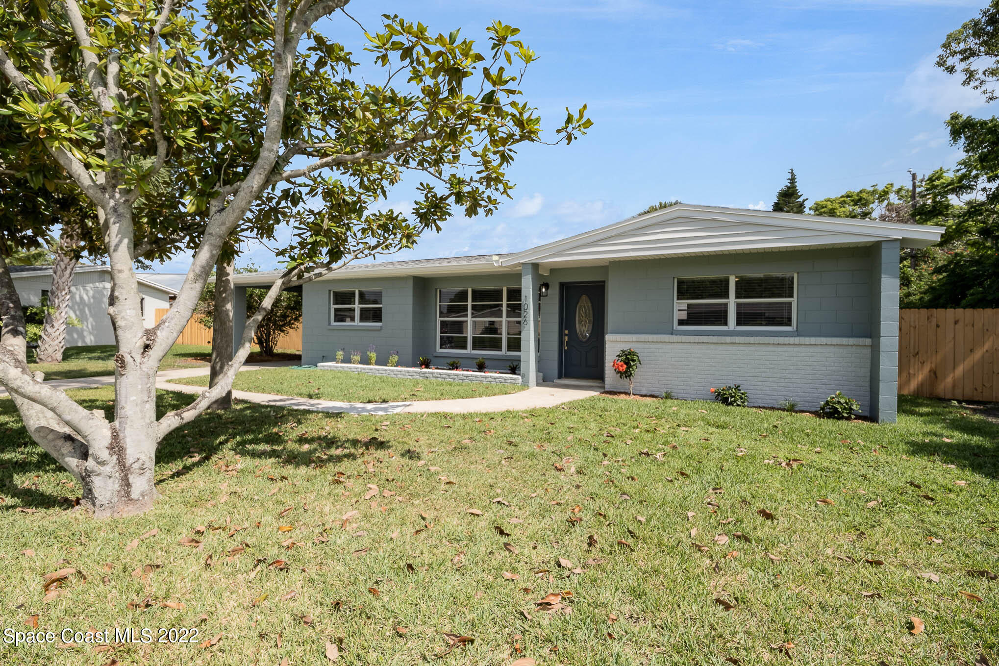 1026 Macco Road Cocoa, FL 32927 - Photo 1 of 20 a view of a house with a backyard