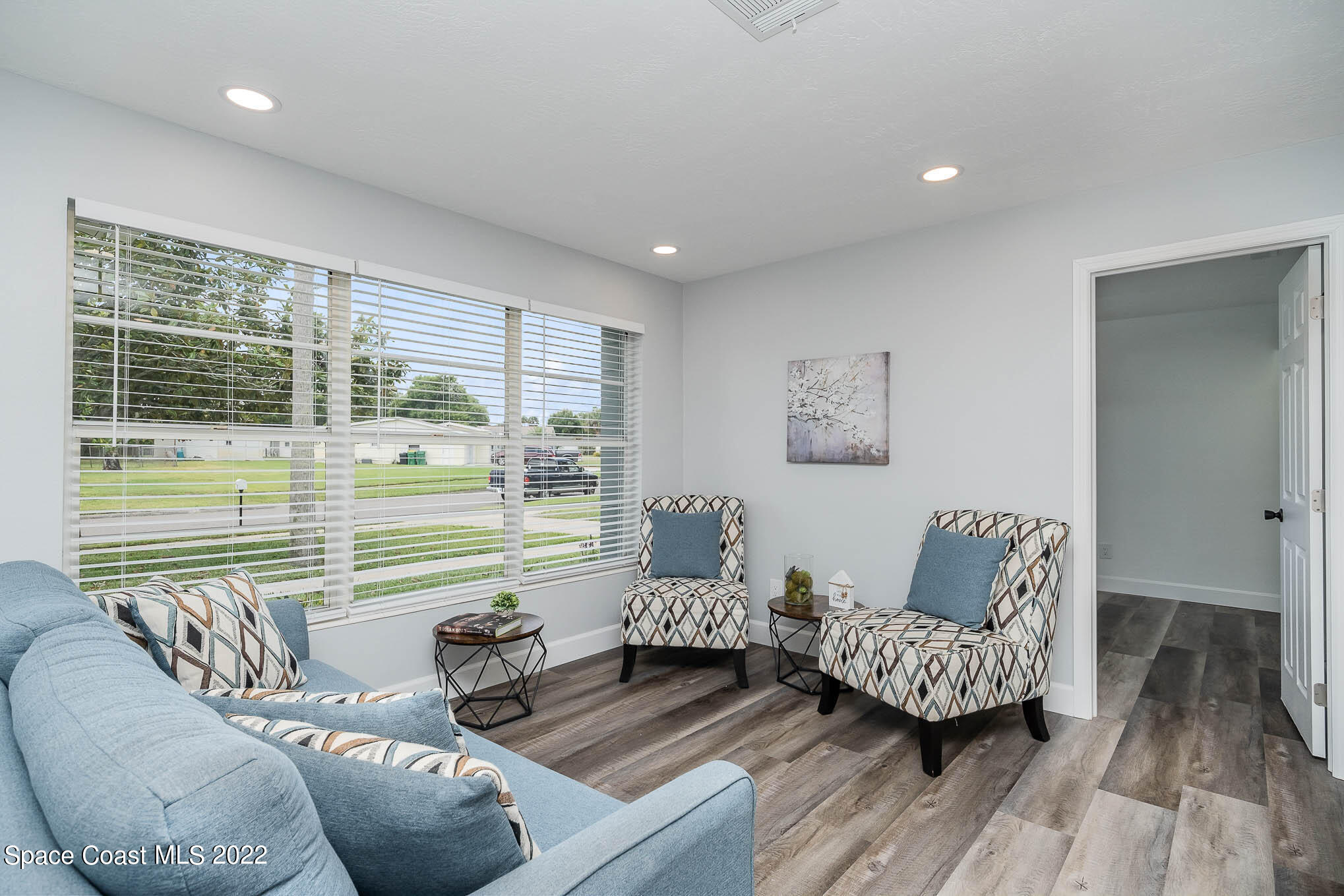 1026 Macco Road Cocoa, FL 32927 - Photo 3 of 20 a living room with furniture and a large window