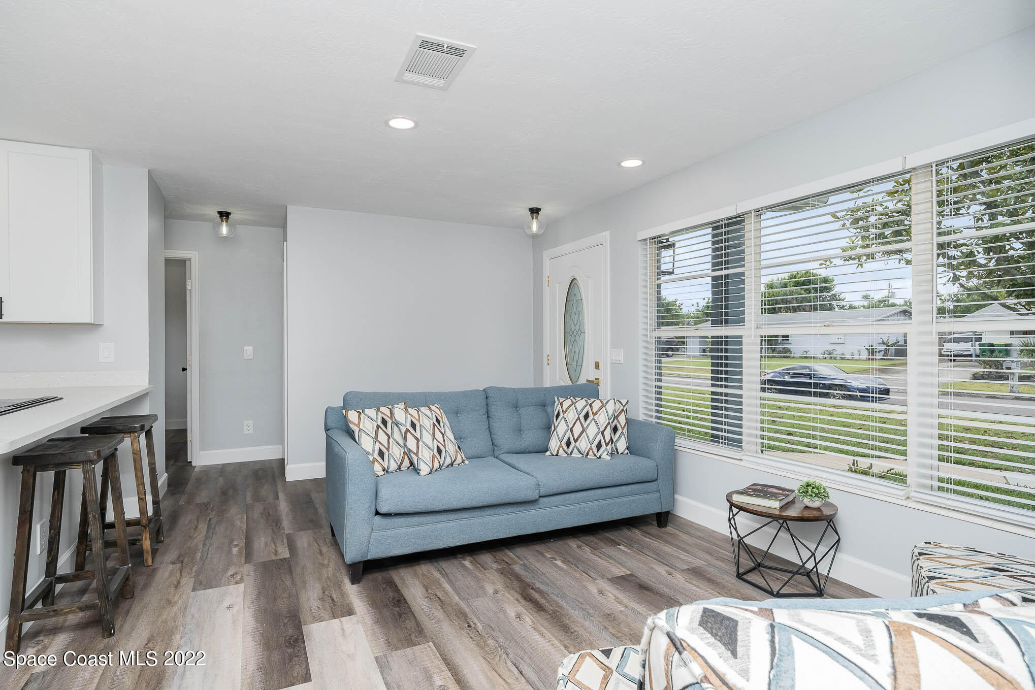 1026 Macco Road Cocoa, FL 32927 - Photo 20 of 20 a living room with furniture and a large window