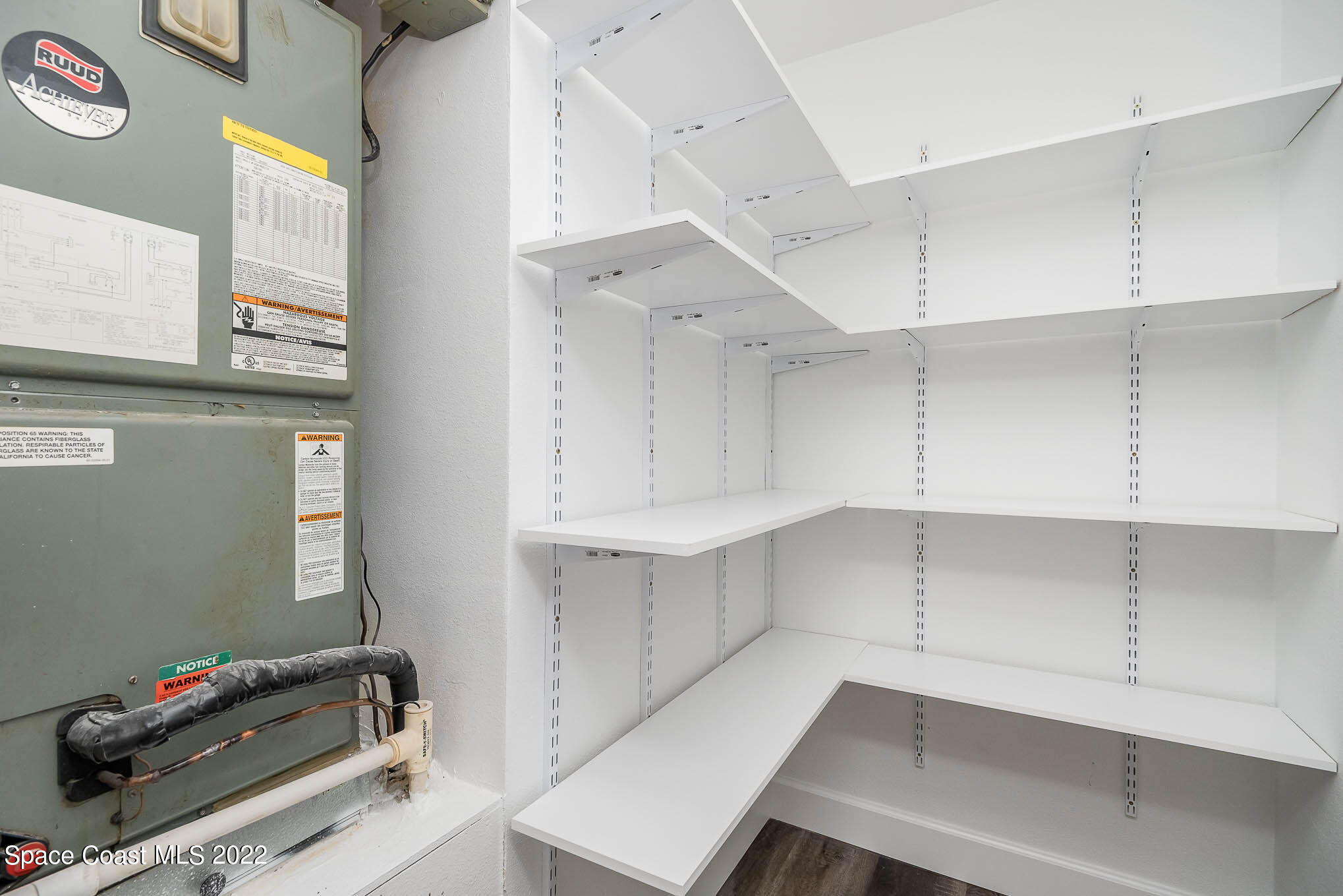 1026 Macco Road Cocoa, FL 32927 - Photo 8 of 20 a room with storage and utility