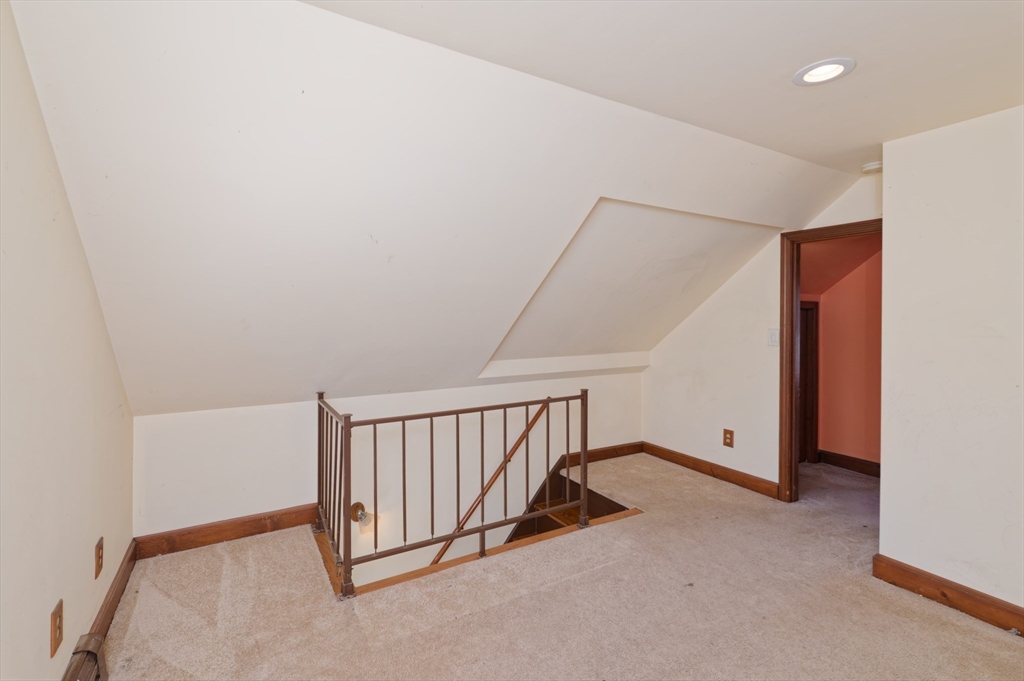 7 Cross Street Natick, MA 01760 - Photo 16 of 31 a view of a hallway with staircase