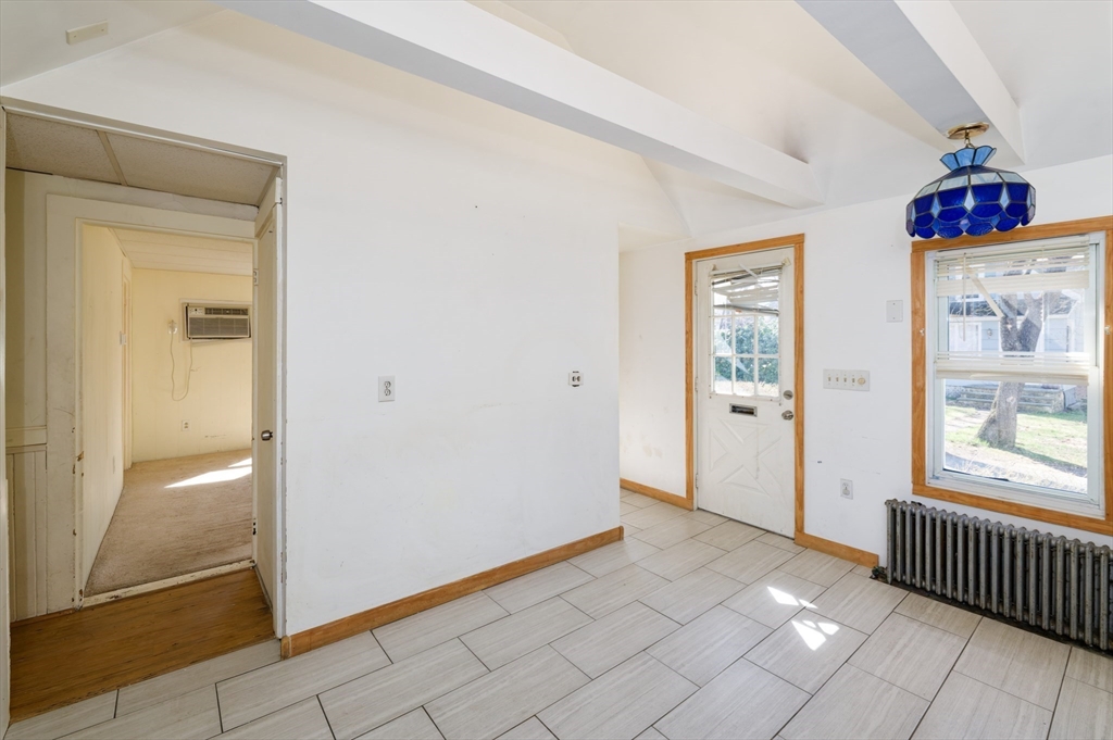 7 Cross Street Natick, MA 01760 - Photo 6 of 31 an empty room with windows and closet